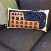 pillow made with Colosseum in Rome, Italy quilt block. Foundation paper piecing quilt. Available at wholecirclestudio.com