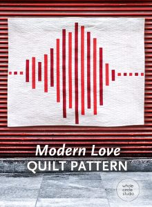 Modern Love Quilt. Inspired by frequency waves, Modern Love is an abstract interpretation of what the word “love” might sound like. This tested pattern contains both detailed instructions and diagrams, making it easy to piece. Instructions are provided for three sizes: Wall, Throw and Queen. Included in this pattern are row locations for all of the fabric pieces so additional colors and/or prints can be added. Designed by Whole Circle Studio.