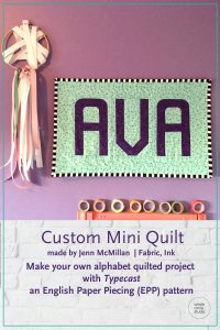 Customize your quilt projects like Jenn McMillan of Fabric, Ink did! Rachel sewed up her letter into a wall hanging mini quilt for her daughter, Ava. Letter made with with Typecast, a modern alphabet English Paper Piecing pattern by Whole Circle Studio