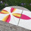 Picnic Petals blocks, a modern spin on the traditional Flowering Snowball quilt block.