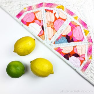 The perfect modern quilt project to freshen up your home, Citrus Slices pairs perfectly with prints or solid fabric. Use what you have in your stash and make it scrappy or grab your favorite fat quarter bundle for the fruit segments and rinds. Foundation paper piece lemons, oranges, grapefruit, limes and more!