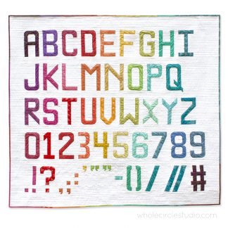 Alphabet quilt made with Typecast Fast, a Foundation Paper Piecing (FPP) Pattern Make all 26 letters of the English alphabet, all the numbers and lots of punctuation — a total of 50 block designs! Pattern by Whole Circle Studio.