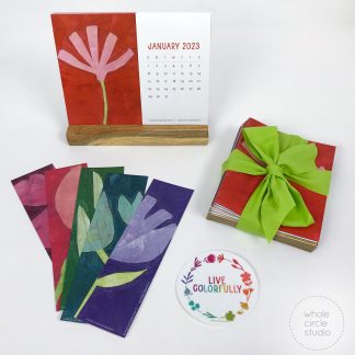 Botanical Beauties floral 2023 Desk calendar with wooden stand, notecards, and bonus bookmarks and Live Colorfully sticker.